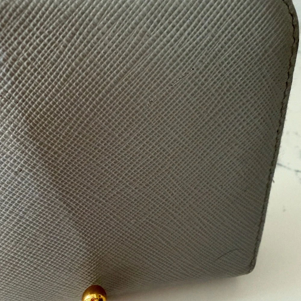Authentic Prada Gray Leather wallet with mint interior